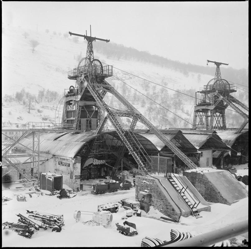 Black and white film negative showing the downcast and upcast headframes, Six Bells Colliery February 1979.  'Six Bells Abertillery Feb 1979' is transcribed from original negative bag.