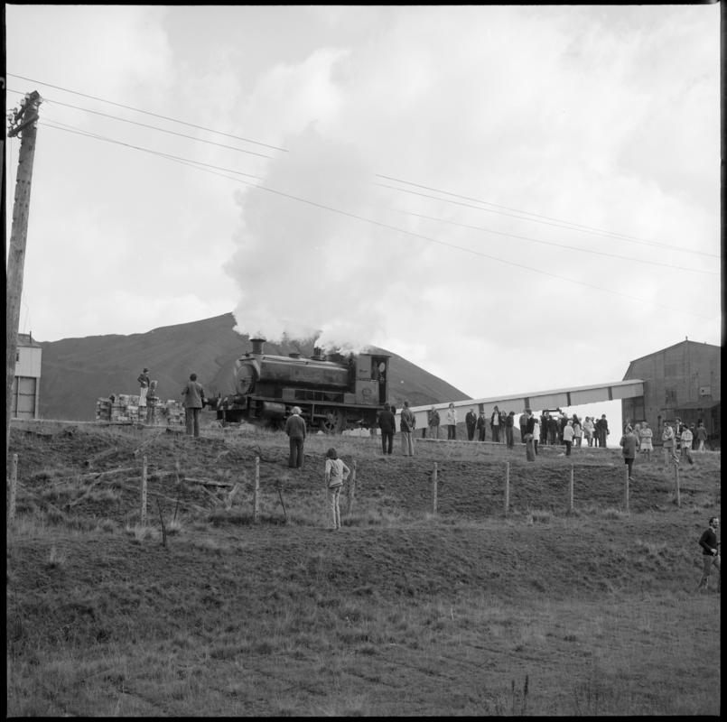 Black and white film negative showing a locomotive passing the washery, Big Pit Colliery.