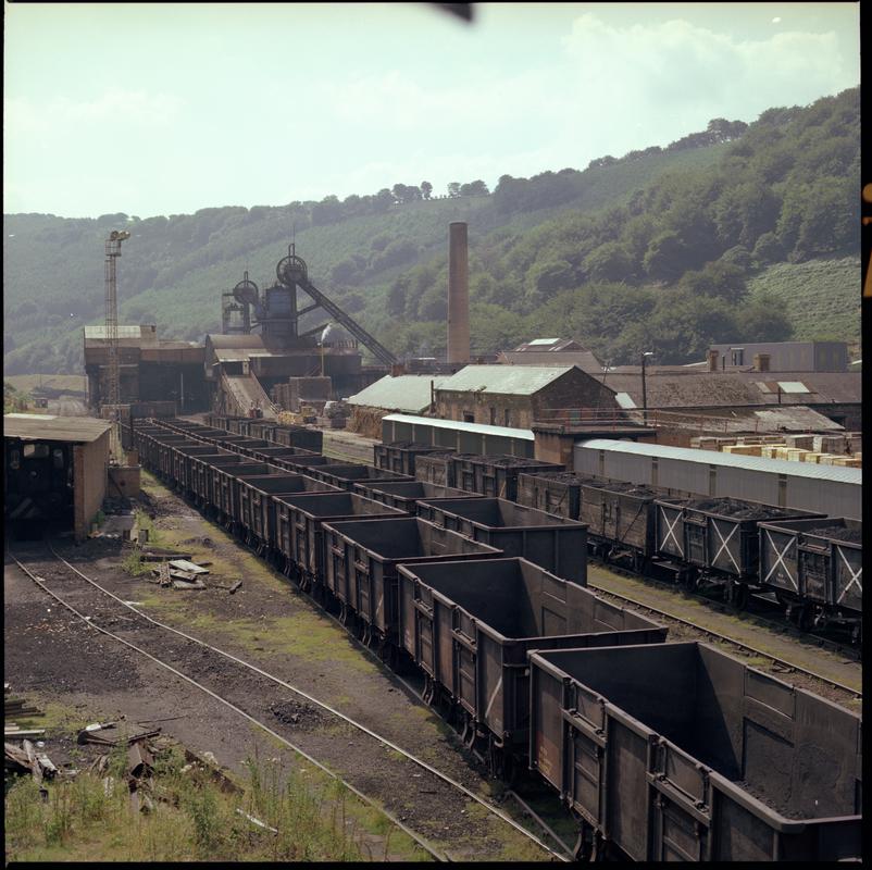 Colour film negative showing train trams in the yard, Marine Colliery.  'Marine' is transcribed from original negative bag.