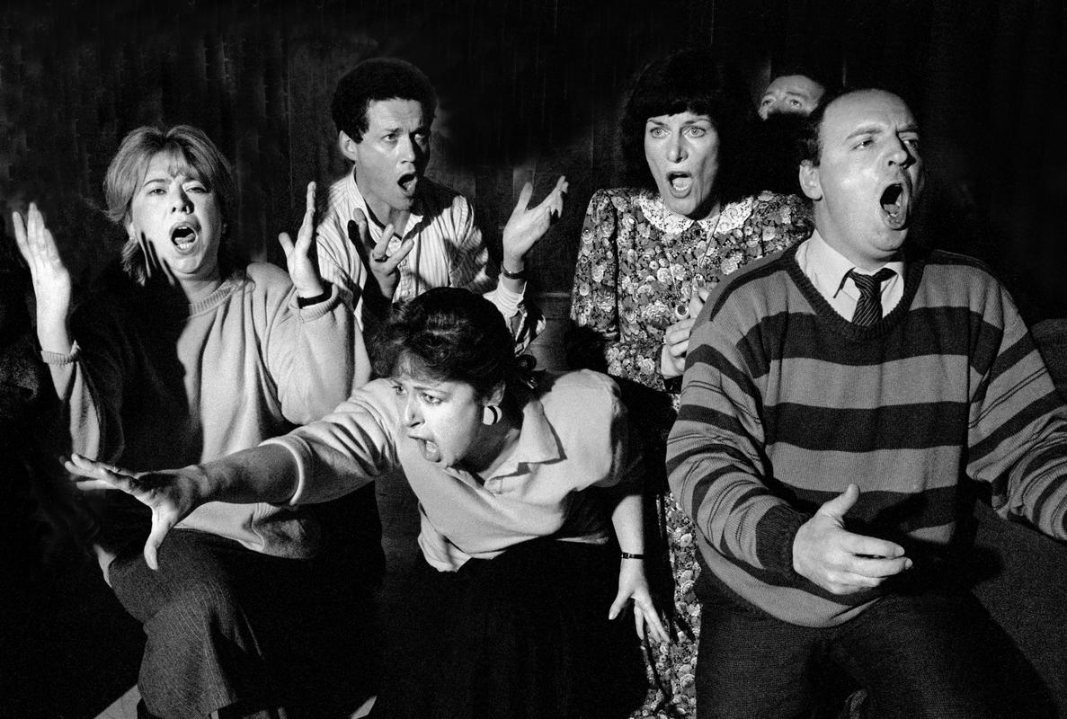 GB. WALES, Cardiff. Members of the chorus of the Welsh National Opera, considered one of the world's best choruses, at rehearsal. South Glamorgan. 1986.