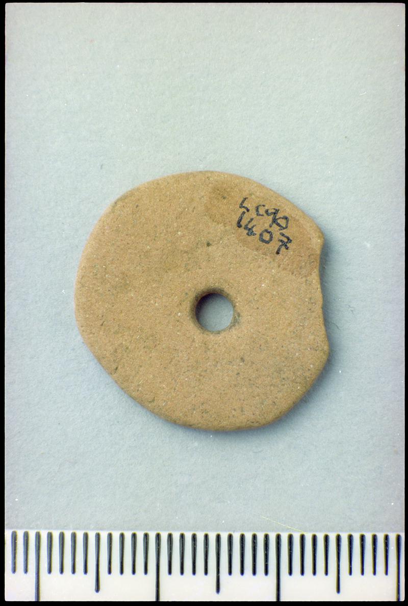 Roman pottery spindle whorl