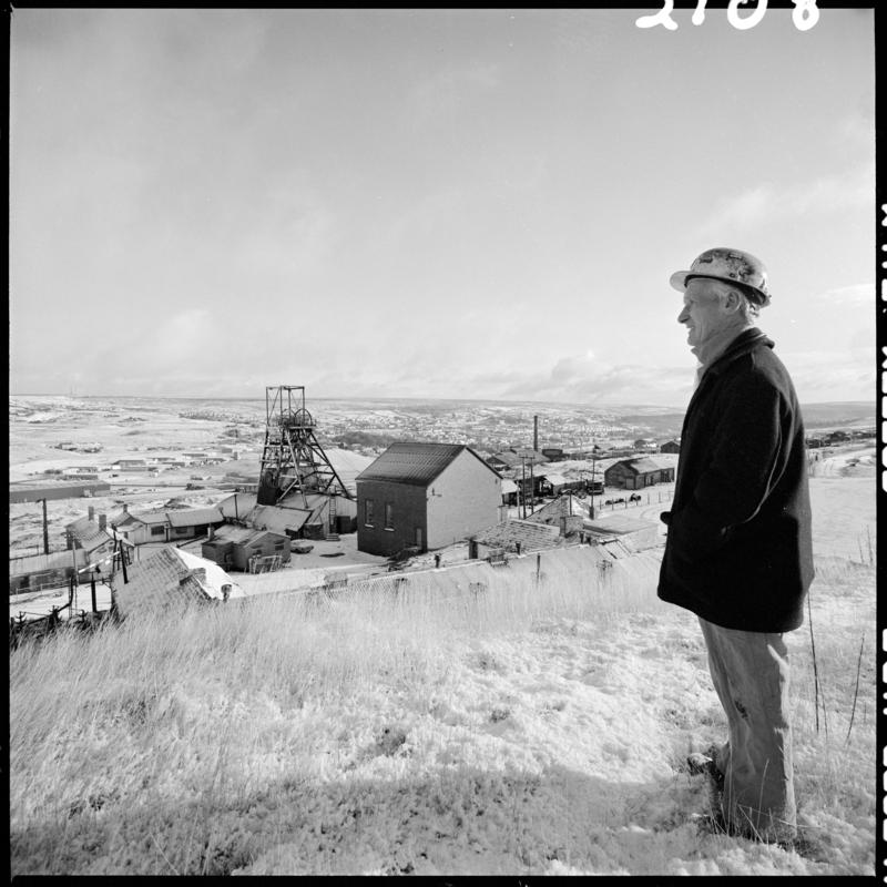Black and white film negative showing Glyn Morgan, the final NCB manager on his last day, Big Pit Colliery 28 November 1980.  'Blaenavon 28/11/80' is transcribed from original negative bag.  Appears to be identical to 2009.3/1608.