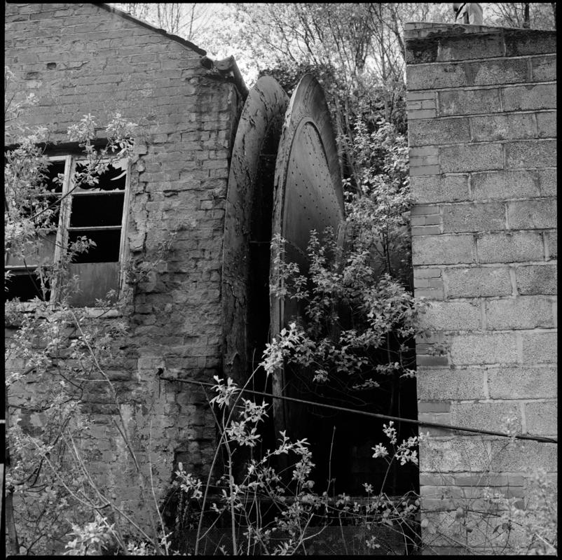 Black and white film negative showing the waddle fan and engine house at Clydach Merthyr Colliery. 'Clydach Merthyr' is transcribed from original negative bag.