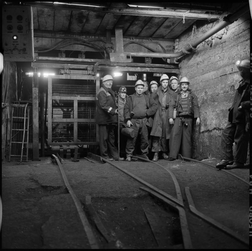 Black and white film negative showing miners at pit bottom, Wyndham Colliery. 'Wyndham' is transcribed from original negative bag.