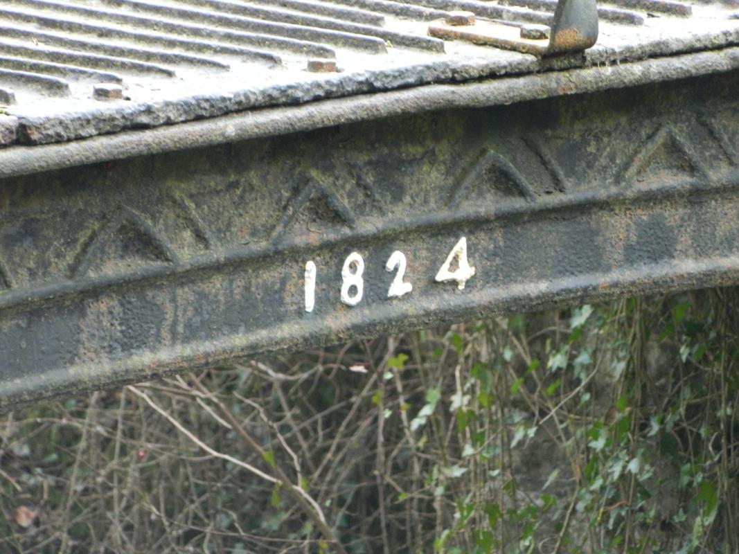 Cast iron bridge dated 1824 over river Clydach into Clydach Ironworks,: detail showing date ë1824í viewed from north west.