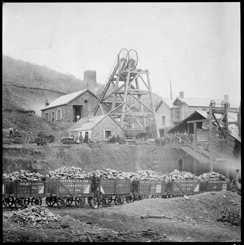 Film negative of a photograph showing a general surface view of Cymmer Colliery, 1860.  'Cymmer' is transcribed from original negative bag.