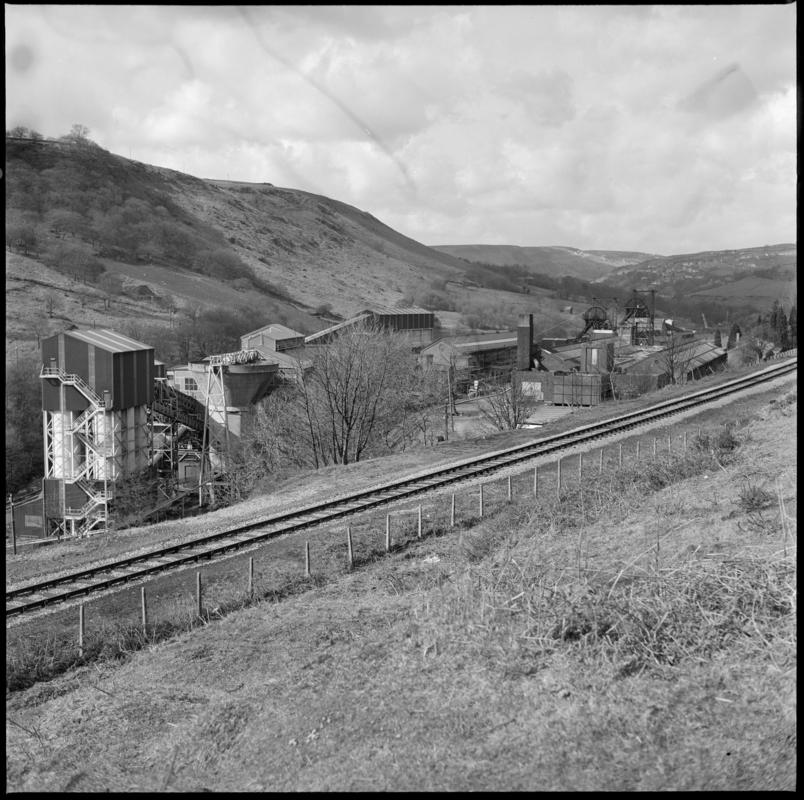 Black and white film negative showing a general view of Taff Merthyr Colliery in the late 1970s.