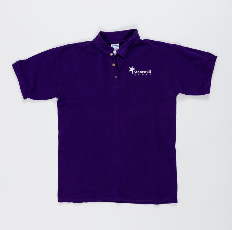 Dark purple t-shirt with 'Stonewall Cymru' logo on the front.