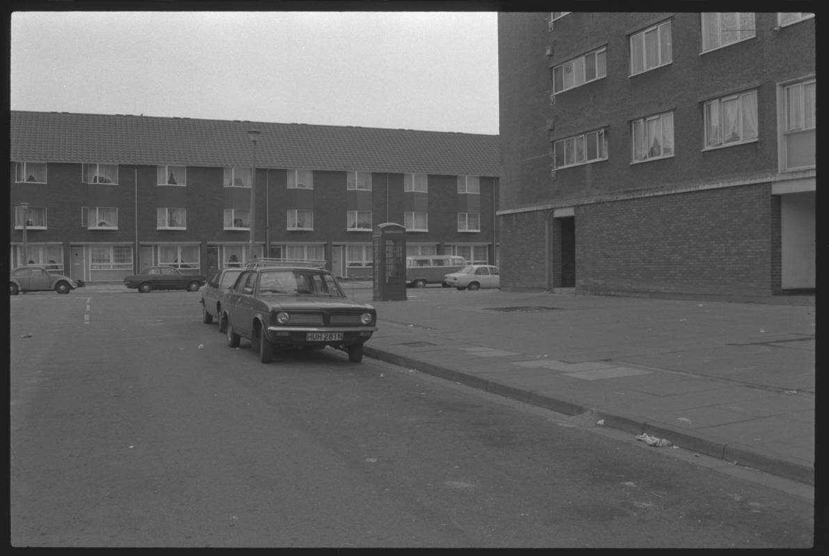 Corner of tower block flats and three storied flats at Loudoun Square, Butetown.