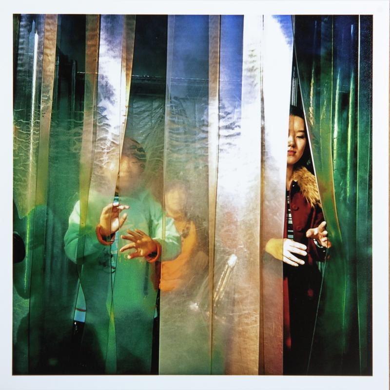 Customers exit a Xinhua bookstore in Beijing