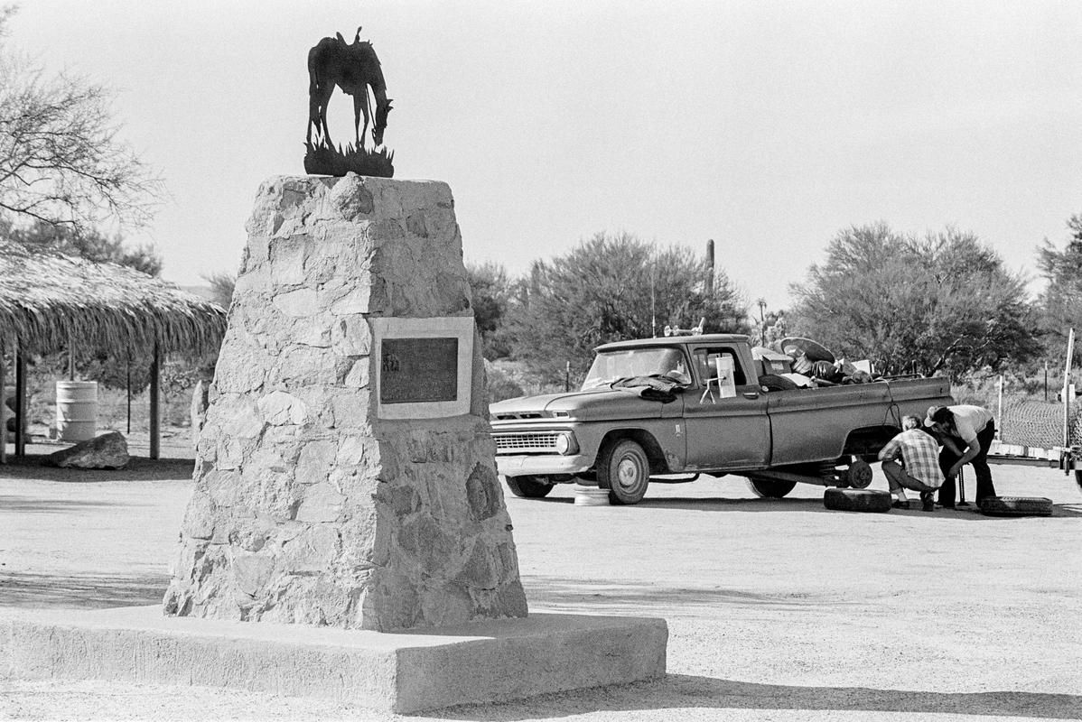 USA. ARIZONA. Tom MIX (cowboy movie star) memorial, Arizona. "Who's spirit left his body on this spot and who's characterisation and portrayals in life served to better fix memories of the old West in the minds of living men".
