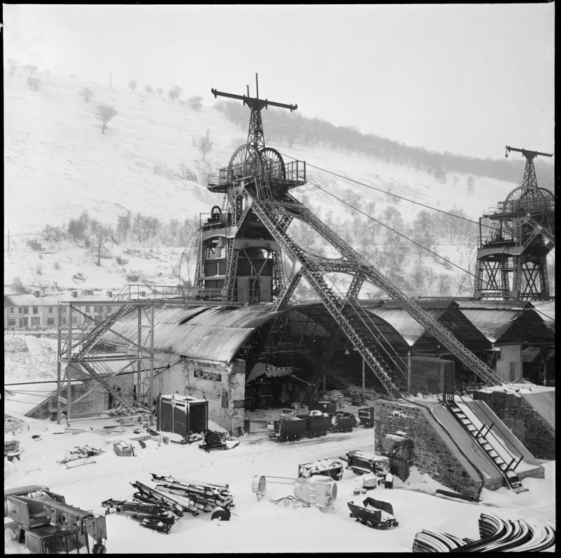 Black and white film negative showing the downcast and upcast headframes, Six Bells Colliery February 1979.  'Six Bells Abertillery Feb 1979' is transcribed from original negative bag.