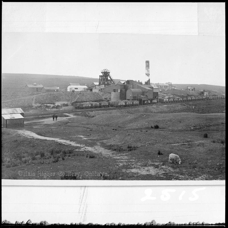 Black and white film negative of a photograph showing a surface view of Onllwyn Colliery. 'Dulais Higher Onllwyn' is transcribed from original negative bag.