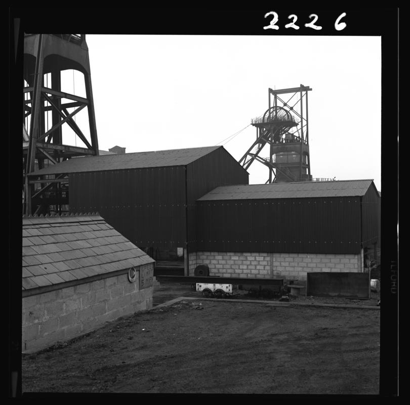 Black and white film negative showing a view of the upcast shaft, Penallta Colliery 9 April 1981.