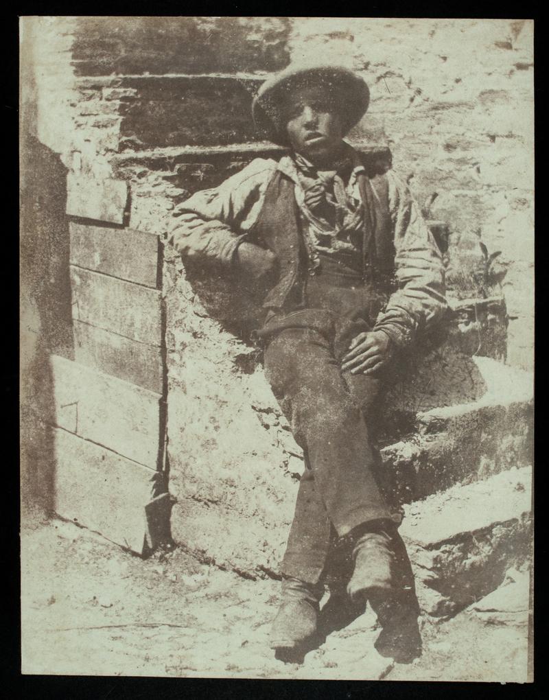 Boy sitting on steps