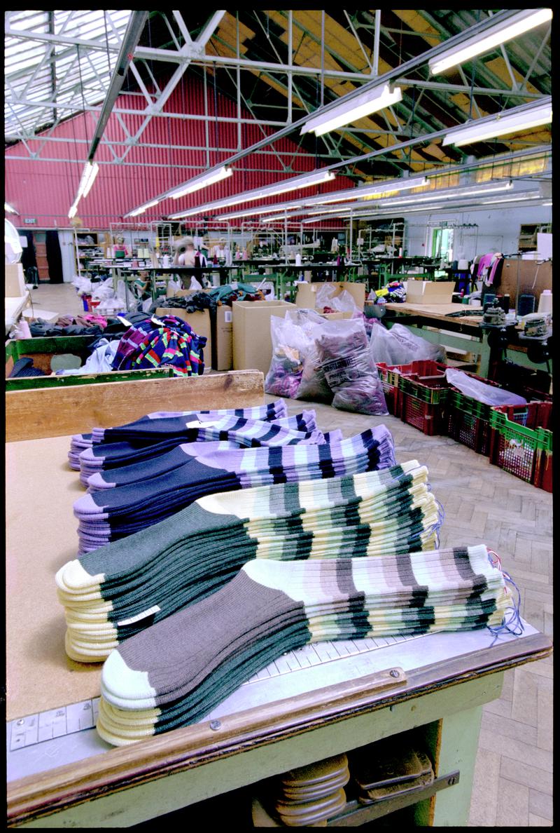 Pairs of finished socks (after washing and pressing) at Corgi Hosiery Ltd factory, Ammanford, 1 July 2002.