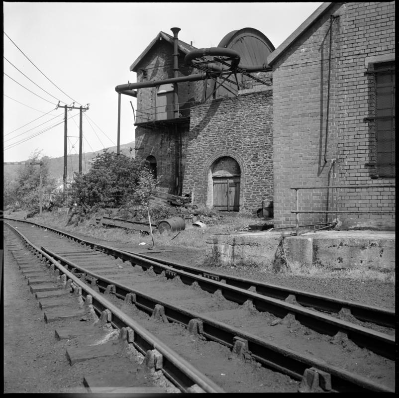 Black and white film negative showing the waddle fan and engine house, Deep Duffryn Colliery 19 May 1977.  'Deep Duffryn 19 May 1977' is transcribed from original negative bag.