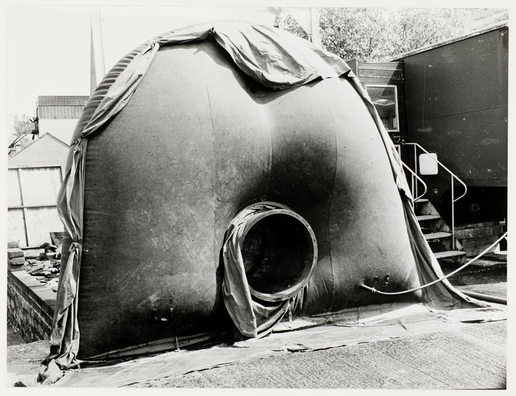 Emergency inflatable 'stopping' for blocking roadways underground. Experimental item developed by Malcolm Davies (Superintendent) and Barry Hall (Assistant Superintendent) at Dinas Mines Rescue Station.