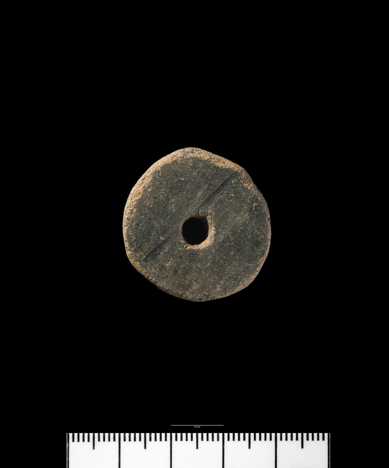 Roman pottery spindle whorl