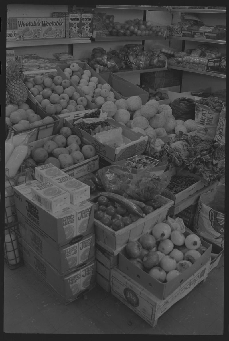 Boxes of fruit and vegetables in supermarket, Loudoun Square, Butetown.