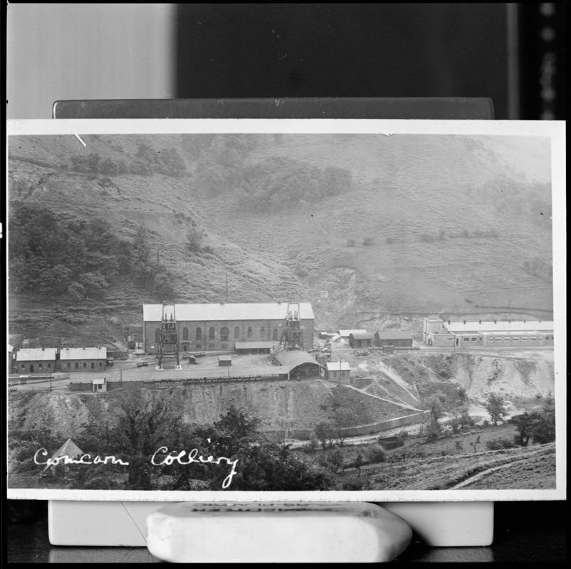 Black and white film negative of a photograph showing a surface view of Cwmcarn Colliery.  'Cwmcarn' is transcribed from original negative bag.  Appears to be identical to 2009.3/2503.