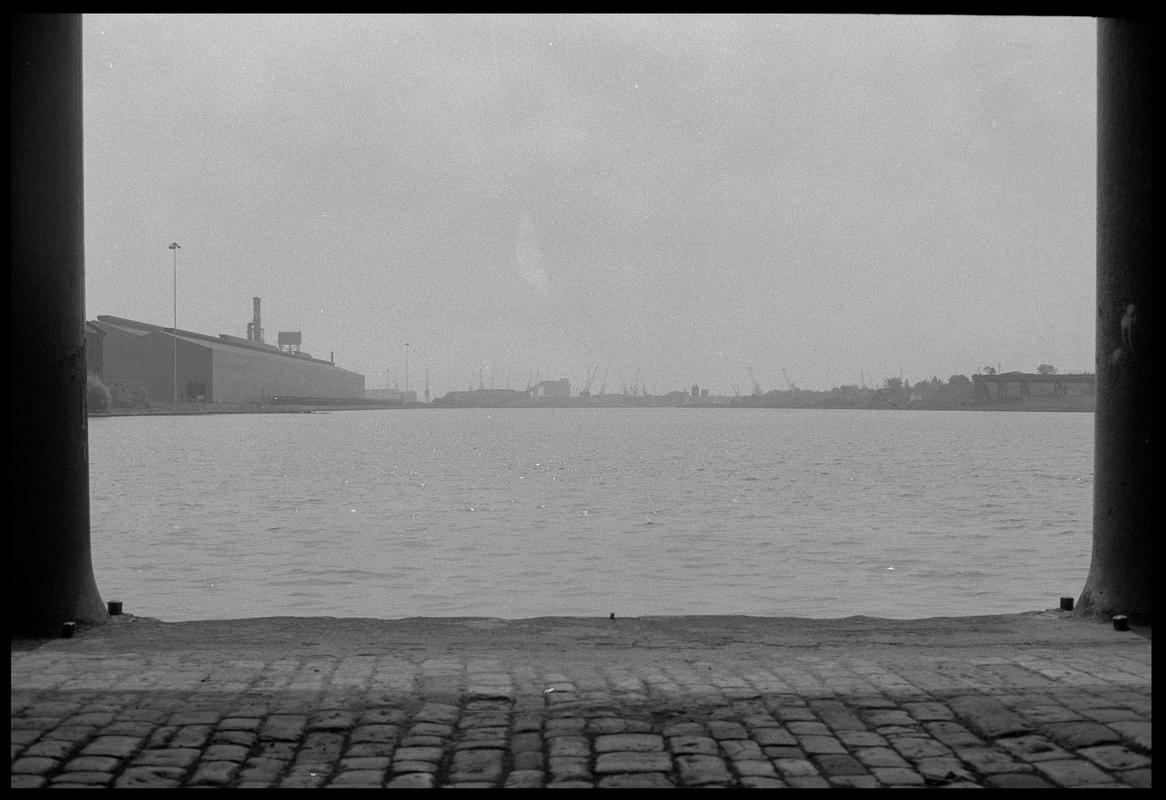 Bute East Dock from between pillars of old warehouse.