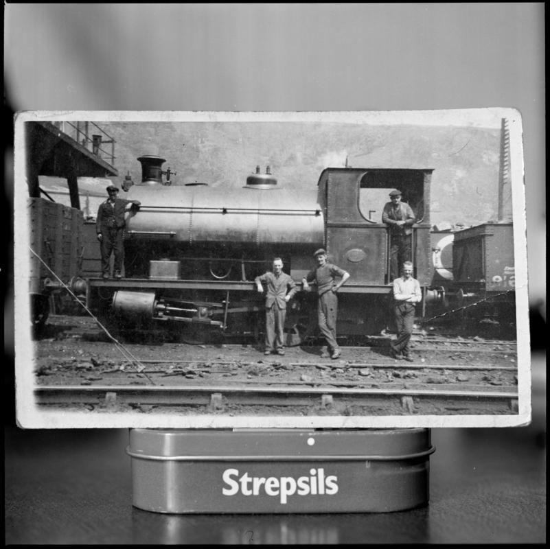 Black and white film negative of a photograph showing a locomotive, Lewis Merthyr Colliery.