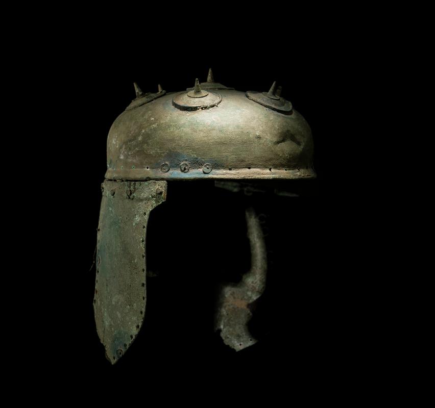 Bronze helmet; bosses and pendant plates added