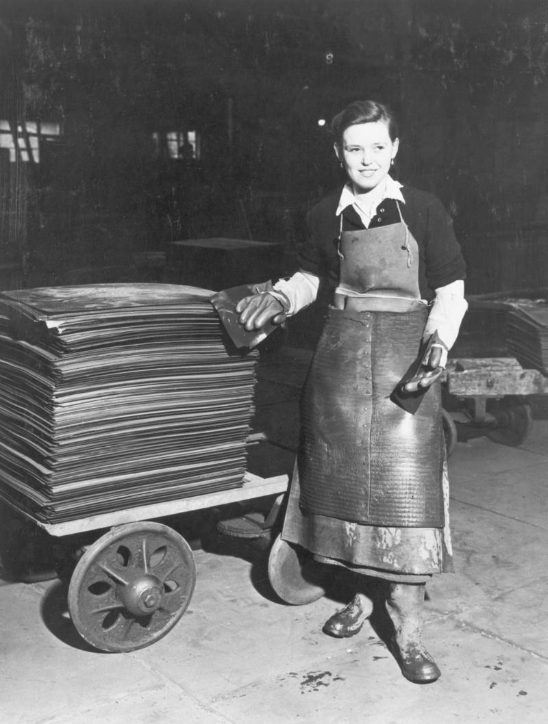 Clayton tiplate works. Pontarddulais, typical pickling girl in protective clothing