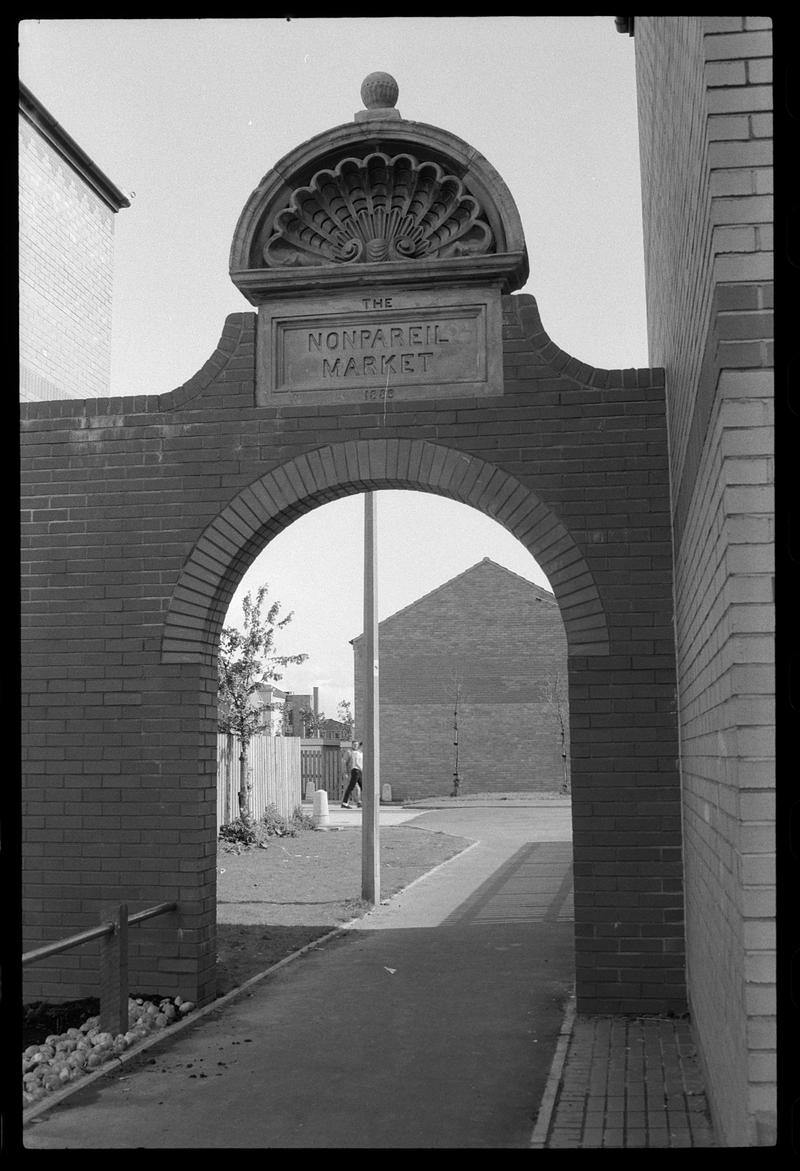 Archway inscribed "The Nonpariel Market", between James Street and Louisa Place.