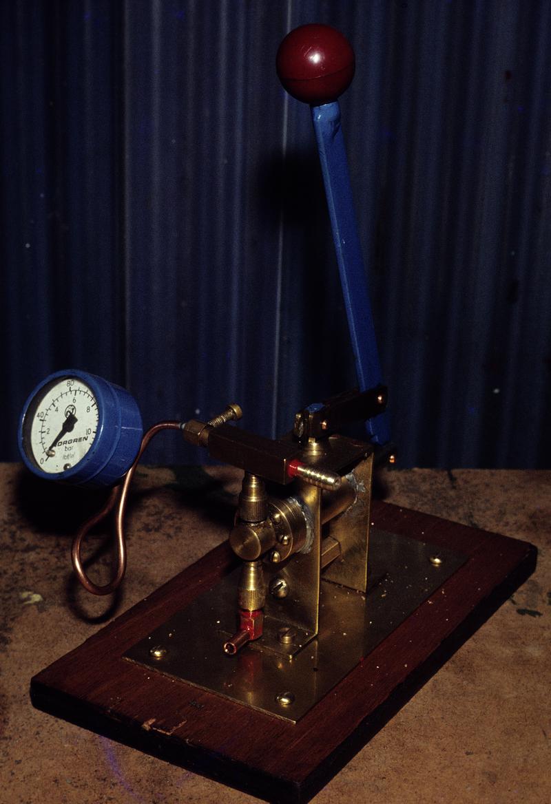 Model of a hand pump made by Samuel Yateman Howard