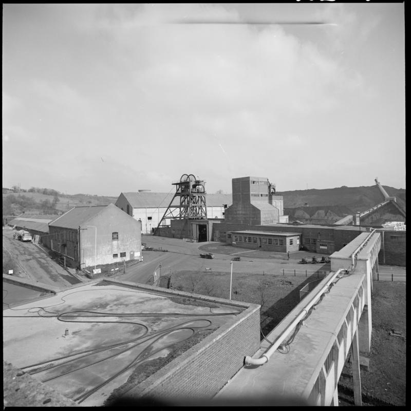 Black and white film negative showing a surface view of Cwm Colliery, April 1981. 'Cwm' is transcribed from original negative bag.