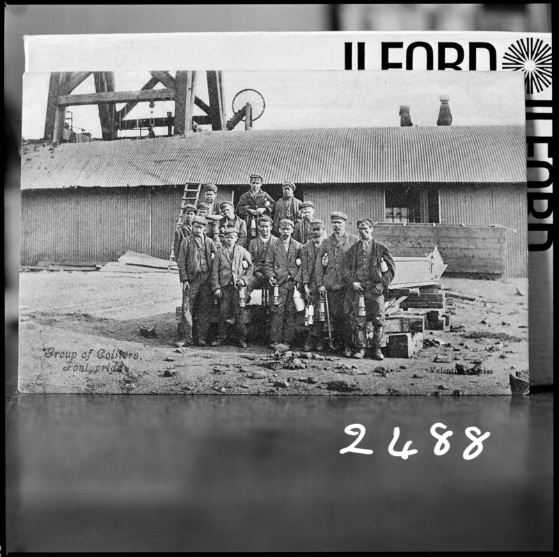 Black and white film negative showing a group of miners at Maritime Colliery c.1900, previously named Pontypridd Colliery.  'Miners Pontypridd c.1900' is transcribed from original negative bag.