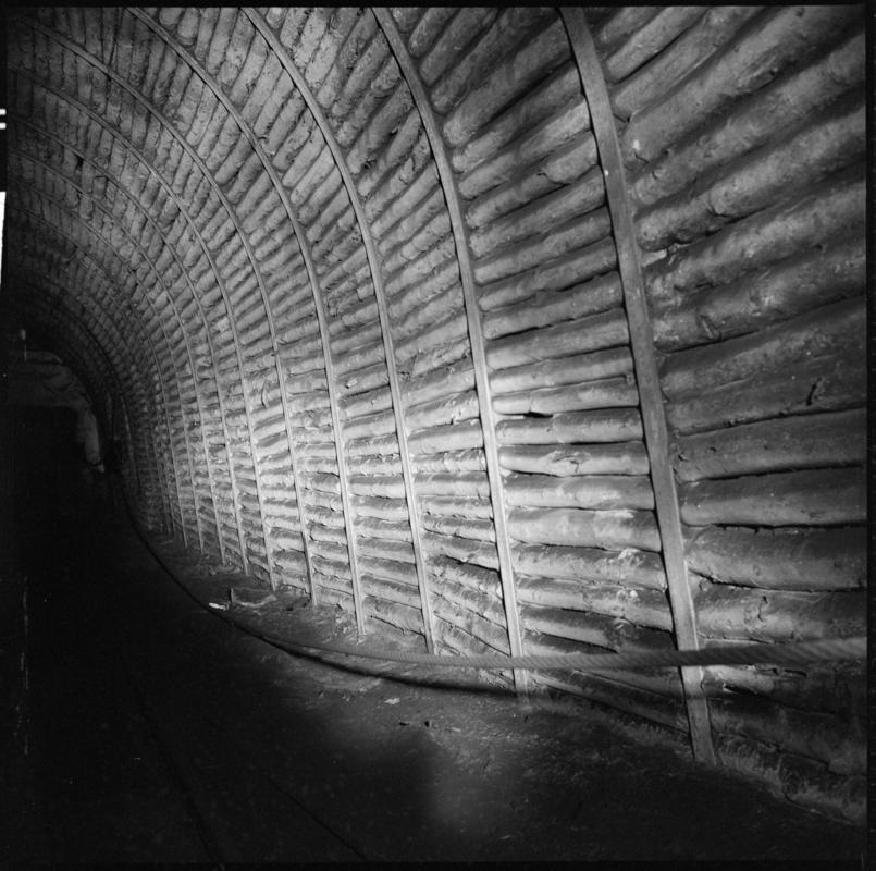 Black and white film negative showing an underground view, Tymawr Colliery 21 December 1976.  'Ty Mawr 21/Dec/76' is transcribed from original negative bag.