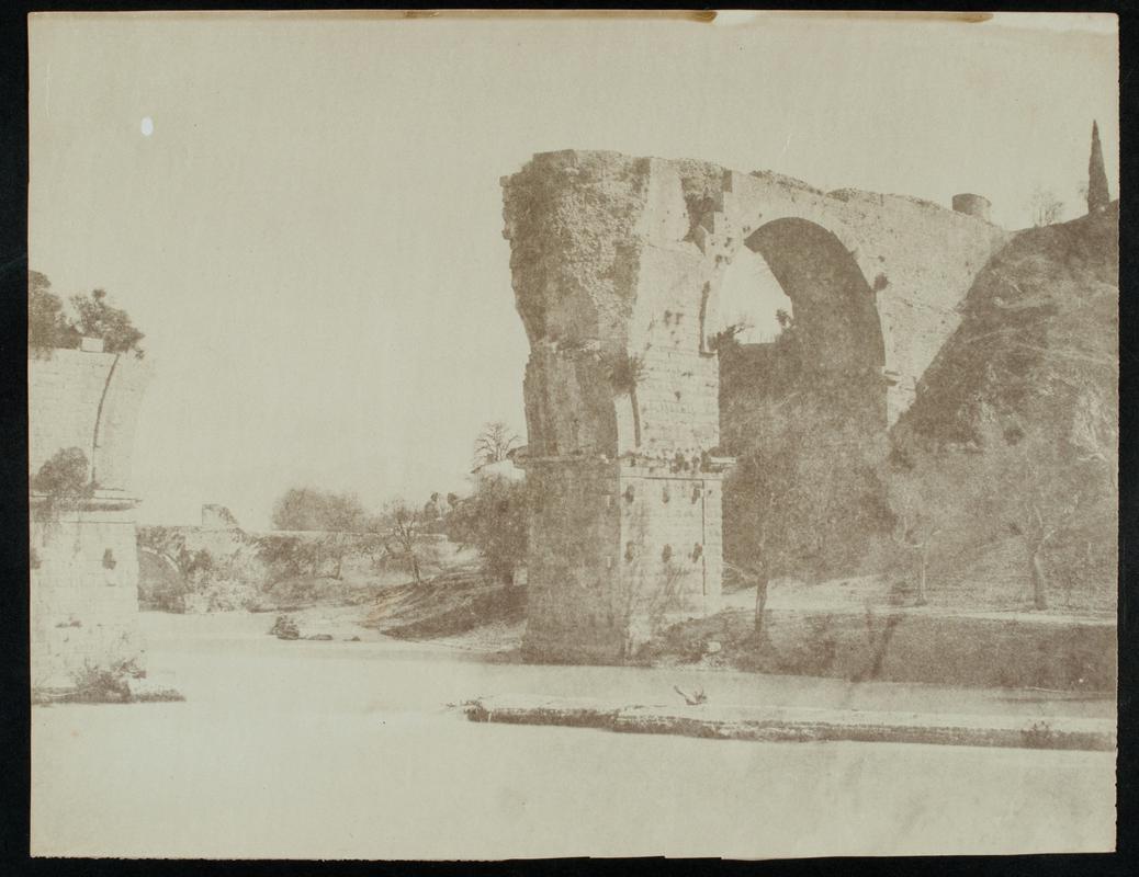 Ruins of Roman bridge over river