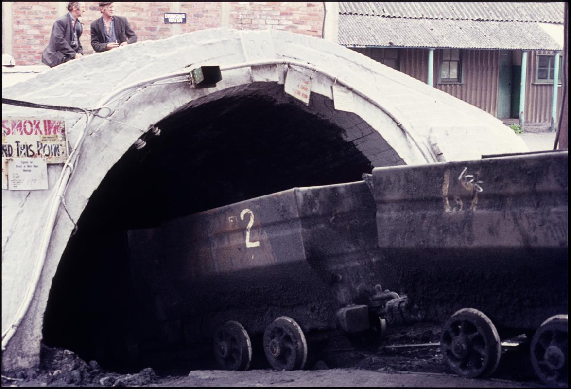 Colour film slide showing a journey of drams being lowered into the slant, Ammanford Colliery 1974.