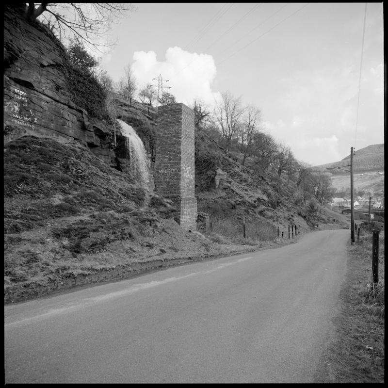 Black and white film negative showing a level and furnace stack, Trehafod, March 1980.  'Level and furnace stack, Trehafod 3/80' is transcribed from original negative bag.