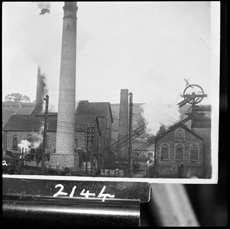 Black and white film negative of a photograph showing a general surface view of Universal Colliery.  'Senghenydd' is transcribed from original negative bag.