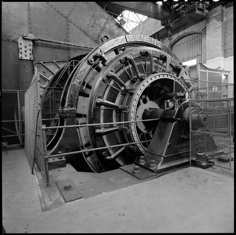 Black and white film negative showing the Siemens Electric winder which was installed at Britannia Colliery in 1910-1914 and worked until the closure of the colliery in 1983.  'Britannia' is transcribed from original negative bag.  Appears to be identical to 2009.3/2269 and 2009.3/2271.