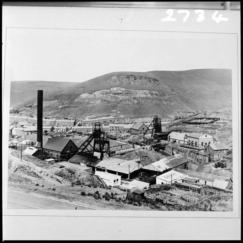 Black and white film negative of a photograph showing a surface view of Avon Colliery, Abergwynfi.  'Avon Colliery' is transcribed from original negative bag.