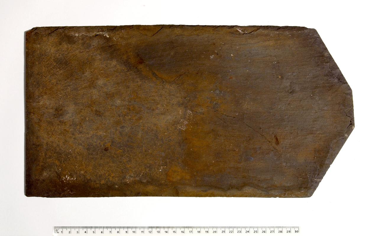 A slate recovered from a boat sunk in Llyn Padarn