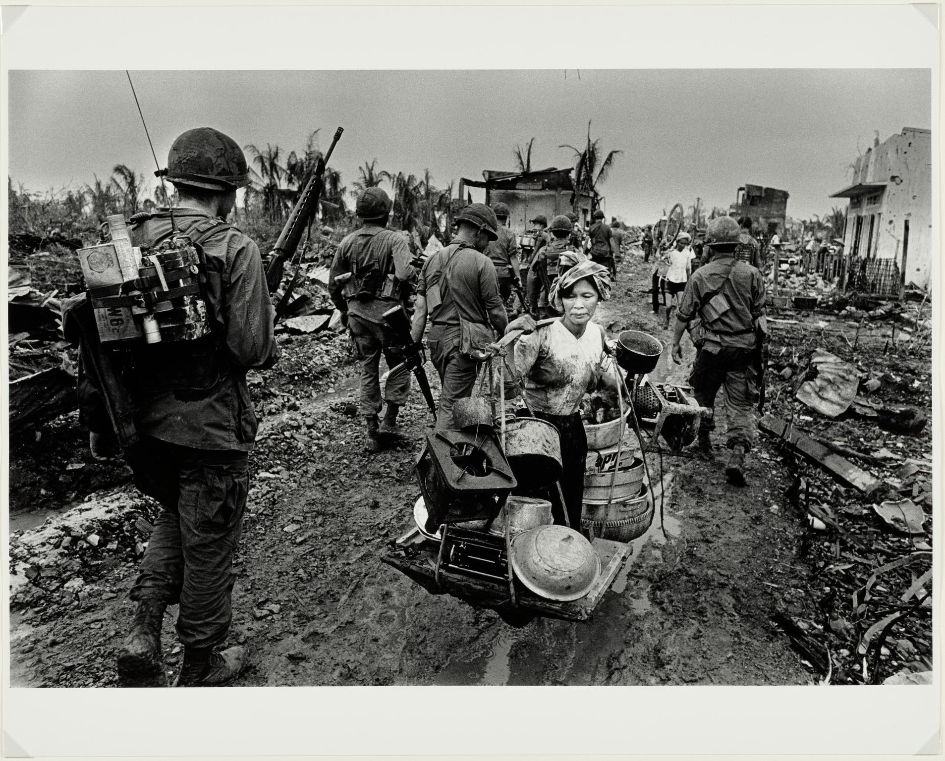 Refugee from US bombing, Saigon, 1968