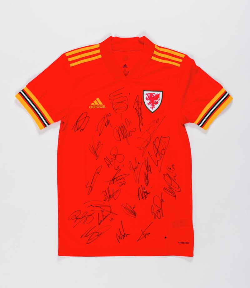 Football shirt signed after the Welsh national football team's match in Cardiff City Stadium against Hungary which has secured them the 2-0 qualifying victory to compete in the UEFA Euro 2020 Finals.