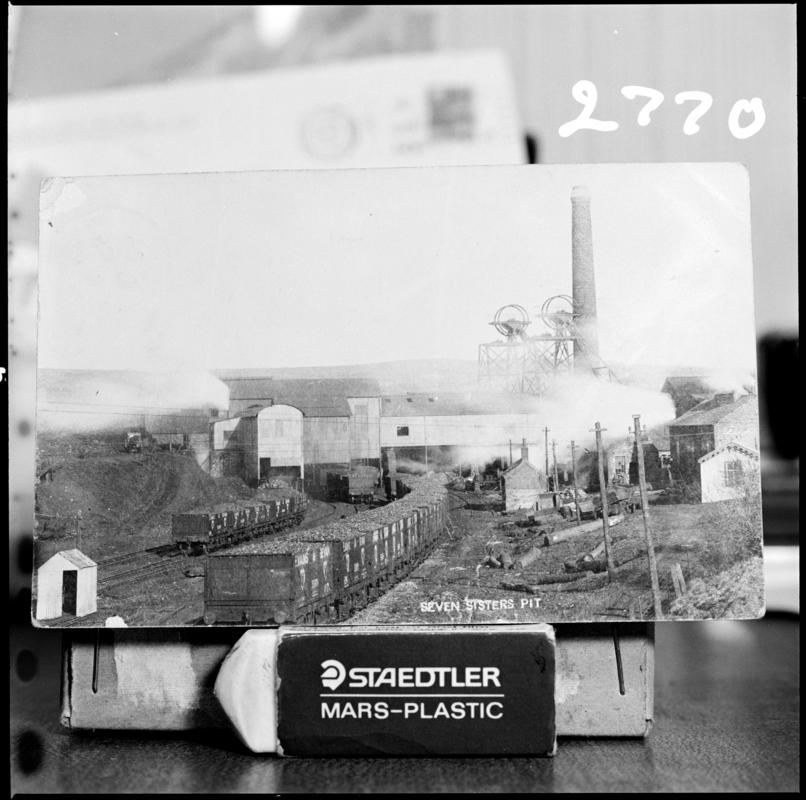 Black and white film negative of a photograph showing a surface view of Seven Sisters Colliery.  'Seven Sisters' is transcribed from original negative bag.