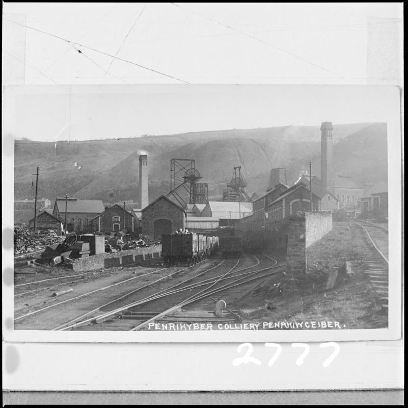 Black and white film negative of a photograph showing a surface view of Penrhiwceibr Colliery. 'Penrikyber' is transcribed from original negative bag.  Appears to be identical to 2009.3/2254.