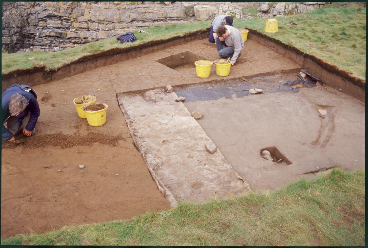 Burry Holms, Gower. 2000 Trench 4. General view of excavations showing layer 43 with the drip gully showing up. Looking north.