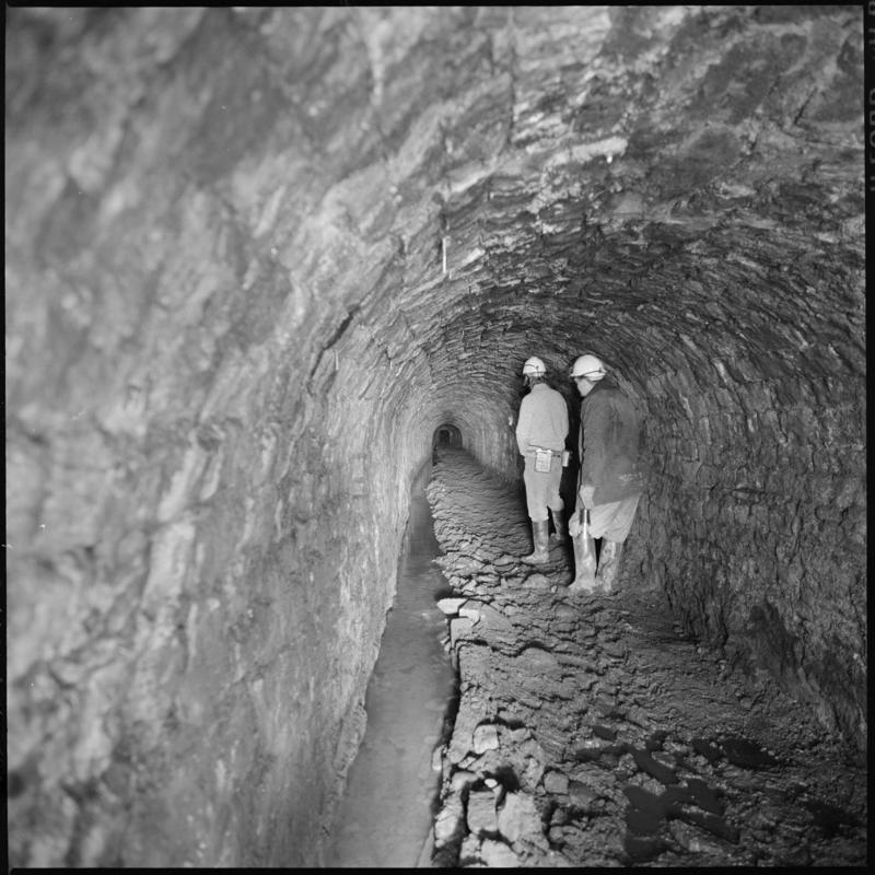 Black and white film negative showing  two men at River Arch, Big Pit Colliery.  Appears to be identical to 2009.3/2988.
