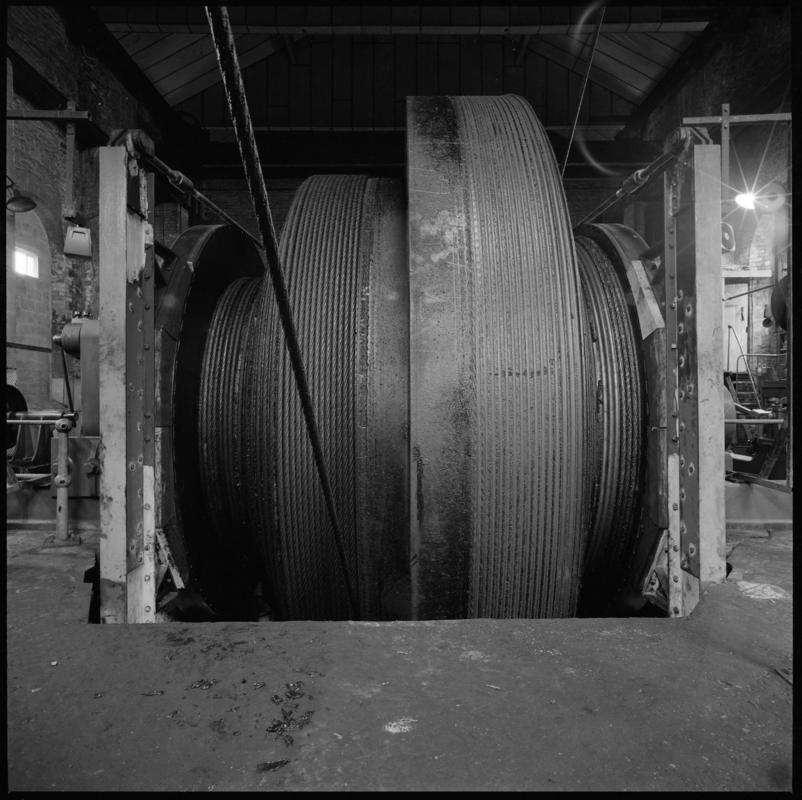 Black and white film negative showing the drum for the Trefor winding engine, Lewis Merthyr Colliery.