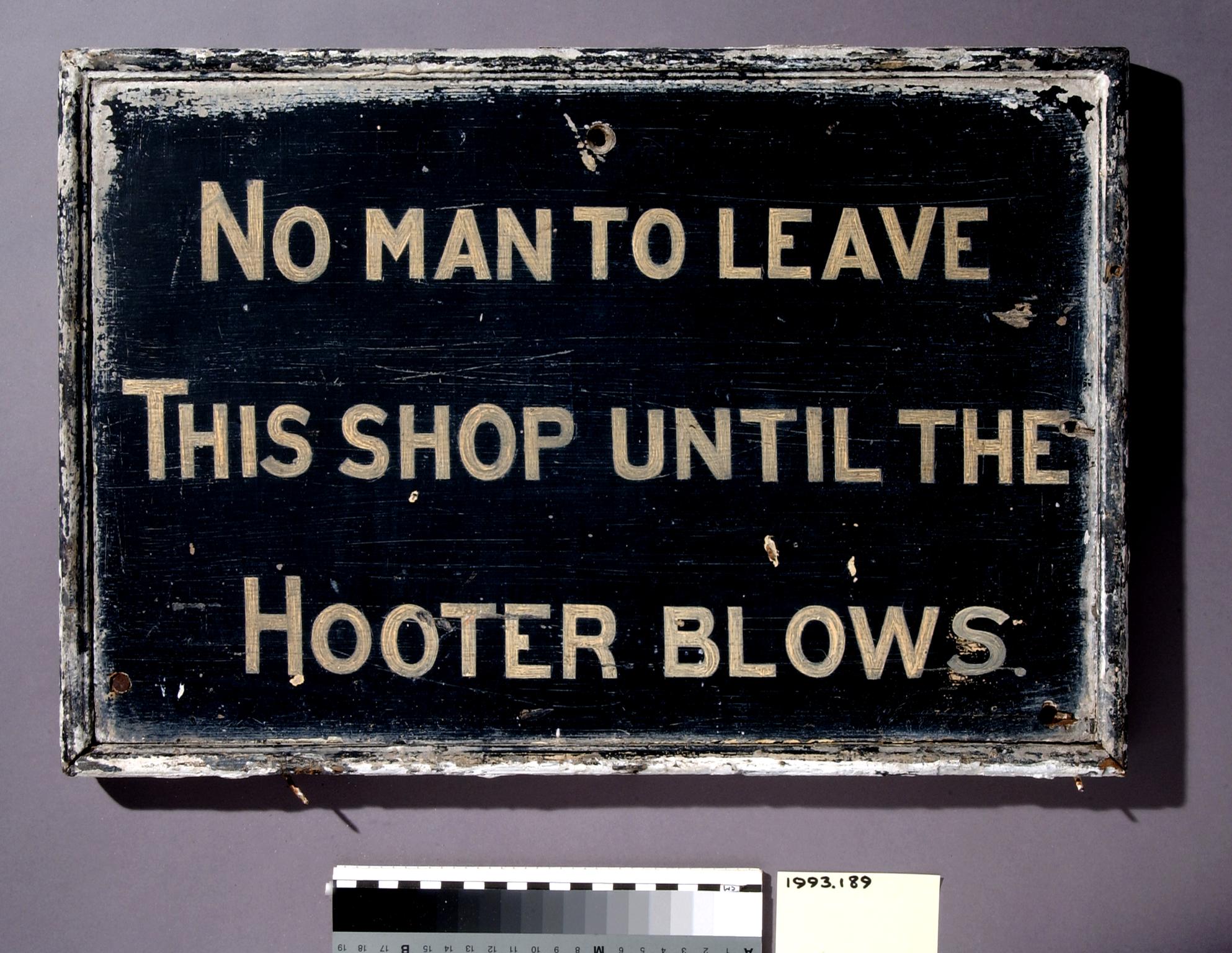 No man to leave this shop until the hooter blows, sign