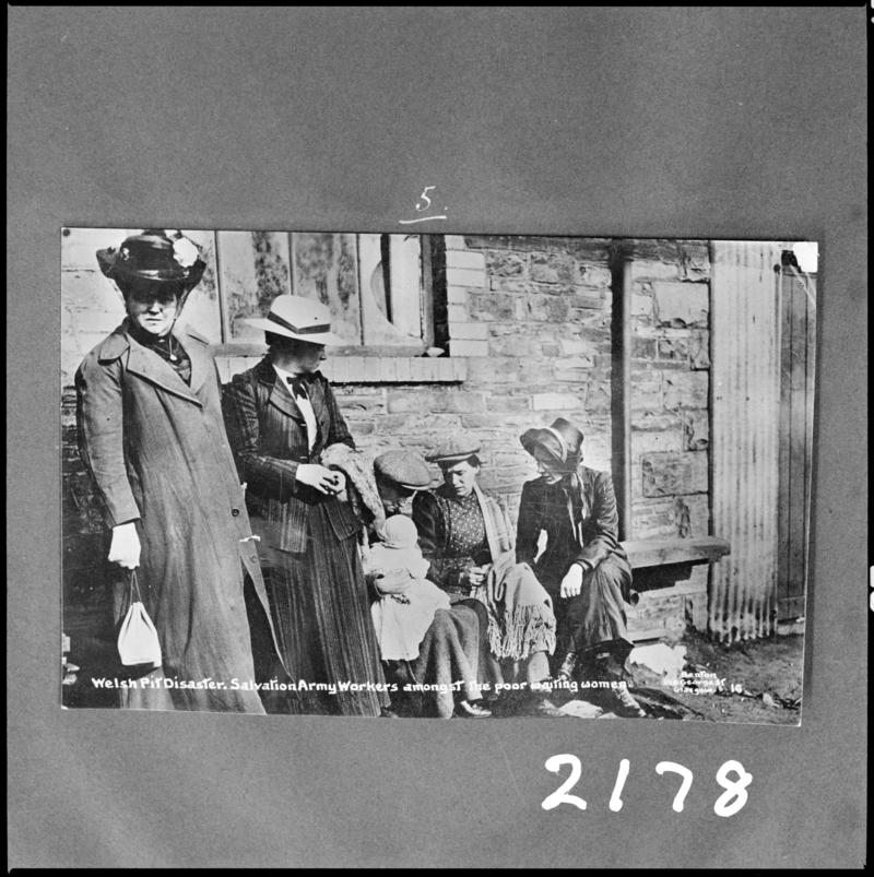 Black and white film negative of a photograph showing Salvation Army workers and women waiting for news following the Universal Pit disaster of 14 October 1913.  'Sen 1913' is transcribed from original negative bag.